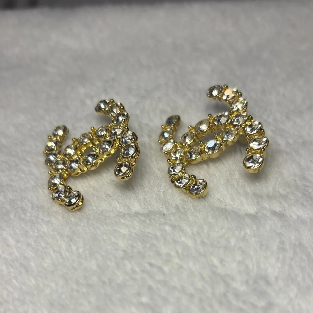Elegant Gold and Silver Crystal Logo Earrings - Picture 3 of 6